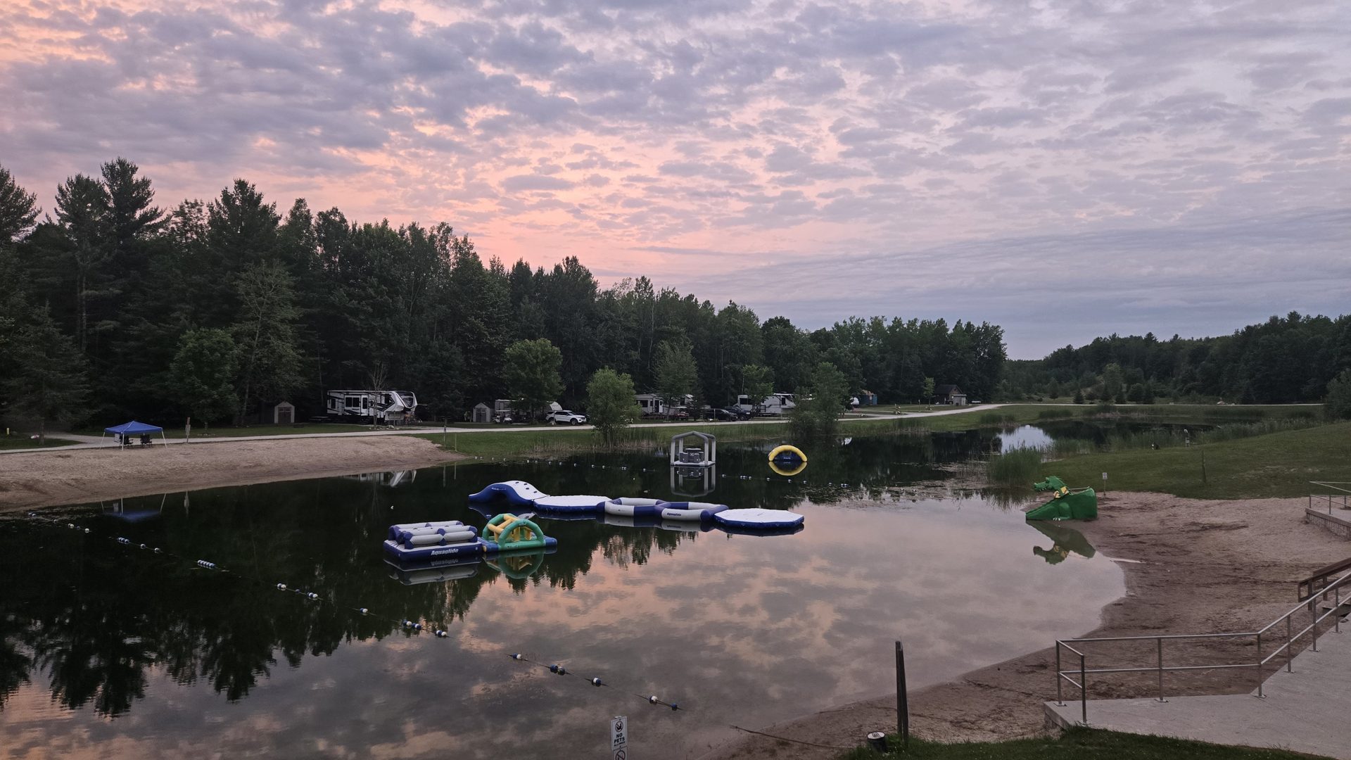 Sunset over Diamond Lake with docks and boats